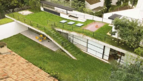 Rooftop advantages shown through elegant planting and seating